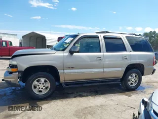 2002 Chevrolet Tahoe Z71 with VIN 1GNEK13Z32R237152, listed as a IAAI auction lot 41855170 with 141,637 mi miles. Bid and sale history available at carsss.com. Image 14.