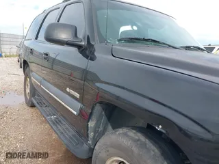 2003 Chevrolet Tahoe LT with VIN 1GNEC13Z83R264751, listed as a IAAI auction lot 41898933 with 300,977 mi miles. Bid and sale history available at carsss.com. Image 6.