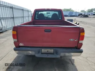 1999 Ford Ranger XL with VIN 1FTYR14V2XPB56627, listed as a Copart auction lot 57036435 with 215,050 mi miles and Salvage title. Bid and sale history available at DreamBid. Image 6.