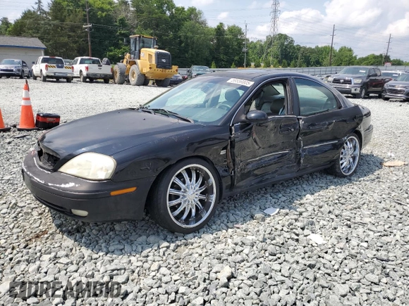 2002 Mercury Sable LS Premium with VIN 1MEHM55S02A621328, listed as a Copart auction lot 59556805 with 183,594 mi miles and Salvage title. Bid and sale history available at DreamBid. Image 1.