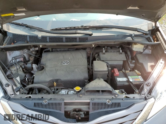 2016 Toyota Sienna LE with VIN 5TDJK3DC3GS134674, listed as a Copart auction lot 67357104 with 105,079 mi miles and Salvage Title. Bid and sale history available at carsss.com. Image 12.