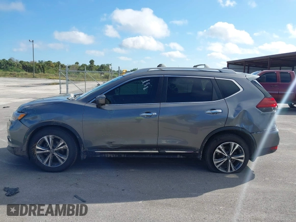 2018 Nissan Rogue S with VIN 5N1AT2MT9JC834646, listed as a IAAI auction lot 41224194 with 87,846 mi miles and . Bid and sale history available at carsss.com. Image 14.