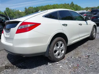 2010 Honda Crosstour EX-L z VIN 5J6TF2H54AL015764, wystawiony jako IAAI lot #42345212 z przebiegiem 141 712 mil mil oraz . Historia ofert i sprzedaży dostępna na DreamBid. Obrazek 4.