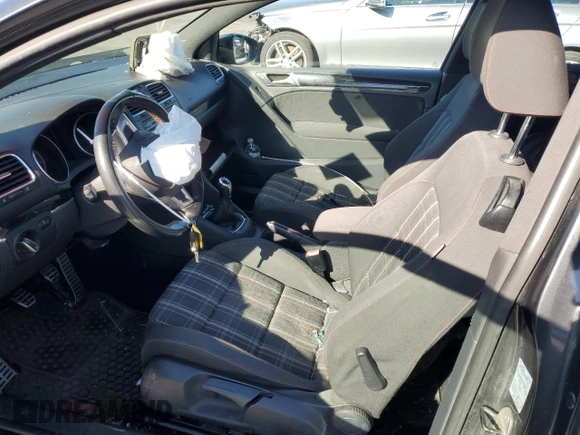 2012 Volkswagen GTI w/Conv & Sunroof with VIN WVWEV7AJ4CW125785, listed as a Copart auction lot 49780335 with 125,837 mi miles and Salvage title. Bid and sale history available at DreamBid. Image 7.