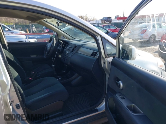 2011 Nissan Versa 1.8 S with VIN 3N1BC1AP5BL432979, listed as a IAAI auction lot 41932890 with 150,041 mi miles. Bid and sale history available at carsss.com. Image 5.
