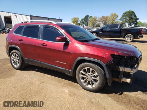 2019 Jeep Cherokee Latitude Plus with VIN 1C4PJLLB0KD128647, listed as a Copart auction lot 50322885 with 125,195 mi miles and Salvage Title. Bid and sale history available at carsss.com. Image 4.