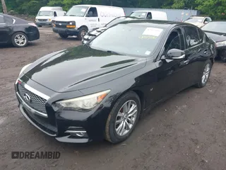 2014 Infiniti Q50 Premium z VIN JN1BV7AR4EM695232, wystawiony jako IAAI lot #42367581 z przebiegiem 138 063 mil mil oraz . Historia ofert i sprzedaży dostępna na DreamBid. Obrazek 2.