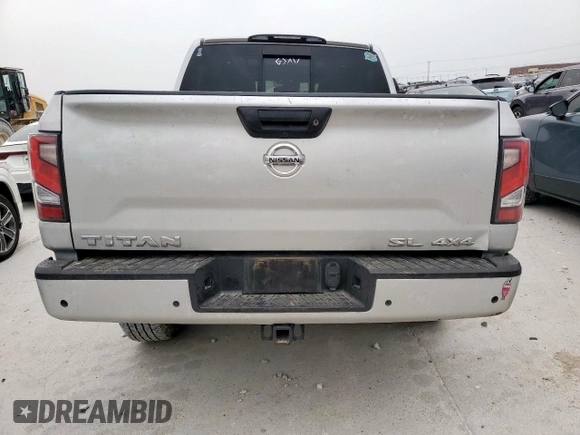 2020 Nissan Titan SL с VIN 1N6AA1ED5LN501764, выставлен на аукционе Copart как лот 53825815 с пробегом 161 163 миль миль и Списание • Salvage title. История ставок и продаж доступна на DreamBid. Изображение 6.
