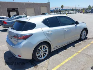 2013 Lexus CT 200h with VIN JTHKD5BH8D2129559, listed as a IAAI auction lot 42592775 with 240,219 mi miles and . Bid and sale history available at DreamBid. Image 4.