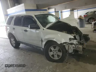 2010 Ford Escape XLS with VIN 1FMCU9C75AKD02318, listed as a Copart auction lot 59130055 with Not provided miles and Salvage title. Bid and sale history available at DreamBid. Image 4.