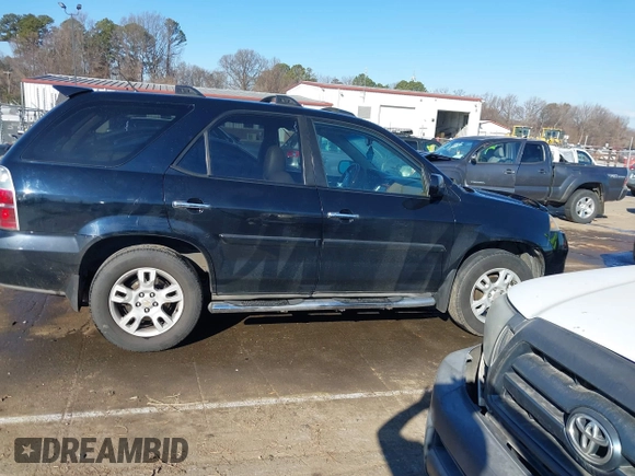 2004 Acura MDX Touring Pkg w/Navigation with VIN 2HNYD18824H501507, listed as a IAAI auction lot 41352086 with 319,002 mi miles. Bid and sale history available at carsss.com. Image 13.