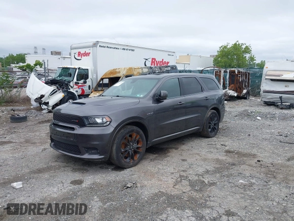 2020 Dodge Durango R/T with VIN 1C4SDJCT2LC346952, listed as a IAAI auction lot 42451221 with 65,696 mi miles and . Bid and sale history available at DreamBid. Image 2.