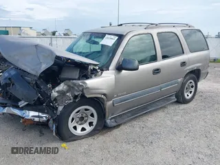 2002 Chevrolet Tahoe LS z VIN 1GNEC13Z72R258244, wystawiony jako IAAI lot #42639069 z przebiegiem Nie podano mil oraz . Historia ofert i sprzedaży dostępna na DreamBid. Obrazek 17.