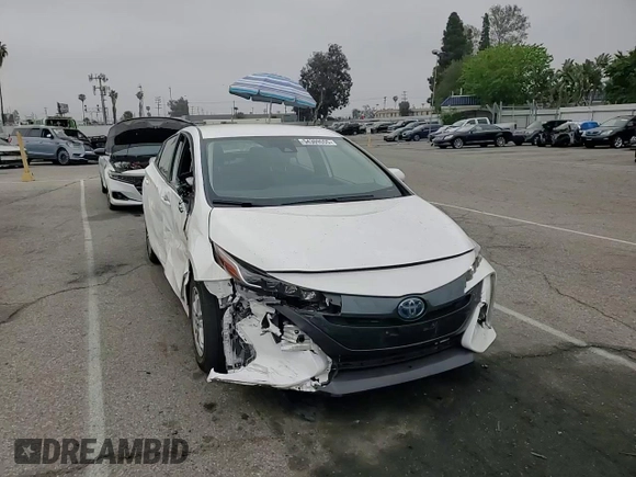 2021 Toyota Prius LE z VIN JTDKAMFP9M3196770, wystawiony jako Copart lot #54309555 z przebiegiem 21 948 mil mil oraz Szkoda całkowita • Salvage title. Historia ofert i sprzedaży dostępna na DreamBid. Obrazek 13.