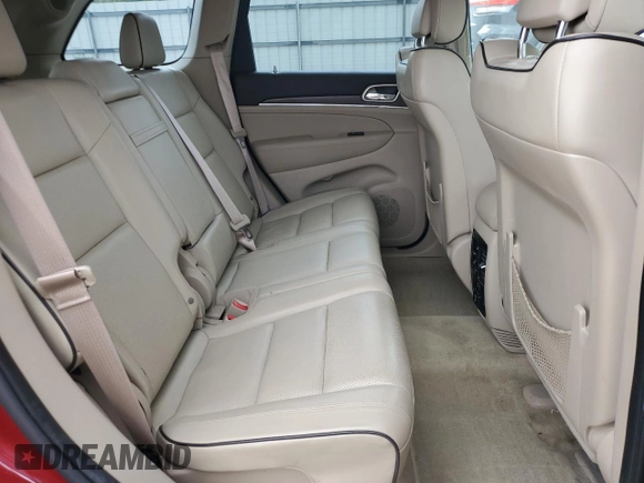2015 Jeep Grand Cherokee Overland with VIN 1C4RJECG2FC823353, listed as a Copart auction lot 58367395 with 72,117 mi miles and Salvage title. Bid and sale history available at DreamBid. Image 11.
