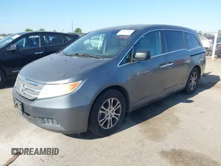 2012 Honda Odyssey EX-L with VIN 5FNRL5H6XCB061026, listed as a IAAI auction lot 42574612 with 144,480 mi miles and . Bid and sale history available at DreamBid. Image 2.