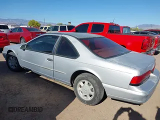 1995 Ford Thunderbird LX with VIN 1FALP62W8SH127506, listed as a IAAI auction lot 41808971 with 139,284 mi miles. Bid and sale history available at carsss.com. Image 3.