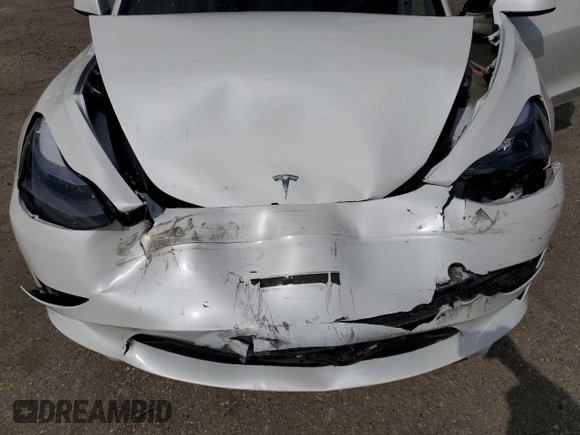 2023 Tesla Model 3 Long Range with VIN 5YJ3E1EB1PF603100, listed as a Copart auction lot 54945865 with 22,865 mi miles and Salvage Title. Bid and sale history available at DreamBid. Image 11.