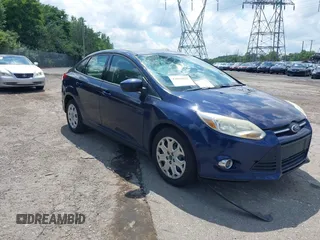 2012 Ford Focus SE with VIN 1FAHP3F22CL157417, listed as a IAAI auction lot 42655527 with 107,472 mi miles and . Bid and sale history available at DreamBid. Image 1.