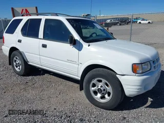 2001 Isuzu Rodeo S with VIN 4S2DM58W214347968, listed as a IAAI auction lot 41871597 with 216,343 mi miles. Bid and sale history available at carsss.com. Image 1.