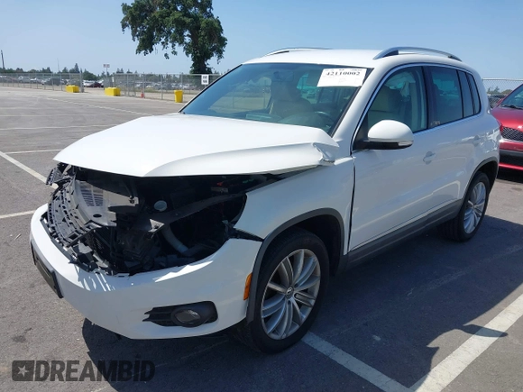 2014 Volkswagen Tiguan SEL with VIN WVGAV3AX9EW512956, listed as a IAAI auction lot 42110002 with 136,034 mi miles and . Bid and sale history available at DreamBid. Image 17.
