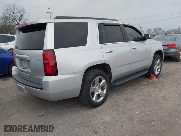2017 Chevrolet Tahoe LT with VIN 1GNSKBKC4HR153369, listed as a IAAI auction lot 41689366 with 134,828 mi miles and . Bid and sale history available at DreamBid. Image 4.