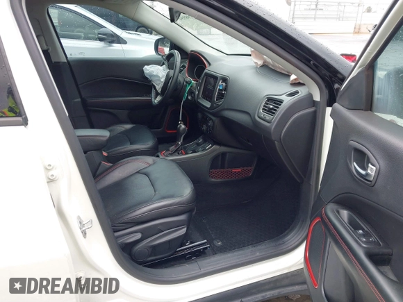 2018 Jeep Compass Trailhawk with VIN 3C4NJDDB0JT306898, listed as a IAAI auction lot 41798954 with 75,852 mi miles and . Bid and sale history available at carsss.com. Image 5.