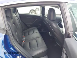 2020 Tesla Model 3 Standard Range Plus z VIN 5YJ3E1EA7LF705809, wystawiony jako IAAI lot #42146416 z przebiegiem 52 056 mil mil oraz . Historia ofert i sprzedaży dostępna na DreamBid. Obrazek 8.