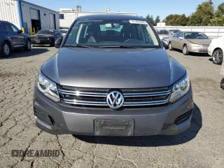 2014 Volkswagen Tiguan SEL with VIN WVGAV3AX8EW585929, listed as a Copart auction lot 61462205 with 63,899 mi miles and Salvage title. Bid and sale history available at DreamBid. Image 5.