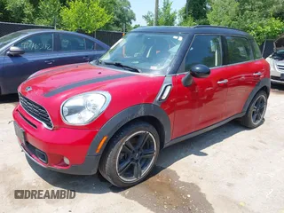2013 MINI Countryman S with VIN WMWZC3C58DWP24865, listed as a IAAI auction lot 42386463 with 100,612 mi miles and . Bid and sale history available at DreamBid. Image 2.