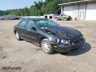 1998 Ford Taurus LX with VIN 1FAFP52U9WA174855, listed as a Copart auction lot 66728184 with 104,796 mi miles and Salvage Title. Bid and sale history available at carsss.com. Image 4.