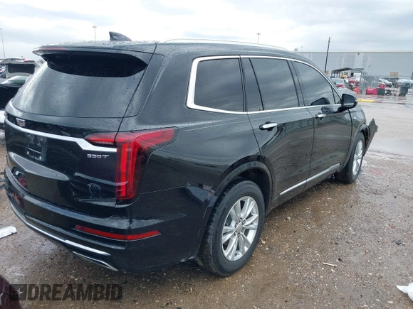 2023 Cadillac XT6 FWD Luxury with VIN 1GYKPAR44PZ114020, listed as a IAAI auction lot 41669115 with 110,305 mi miles and . Bid and sale history available at DreamBid. Image 4.