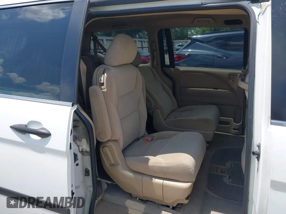 2007 Honda Odyssey LX with VIN 5FNRL382X7B135892, listed as a IAAI auction lot 42223231 with 204,054 mi miles and . Bid and sale history available at DreamBid. Image 8.