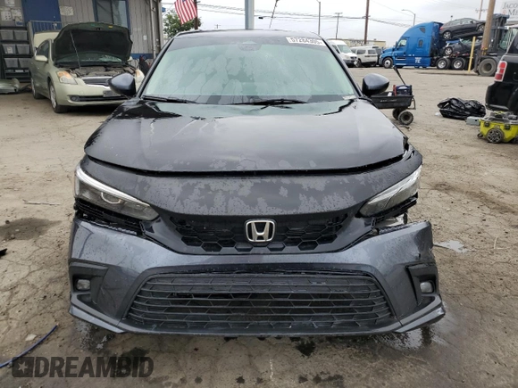 2023 Honda Civic EX z VIN 2HGFE1F72PH312995, wystawiony jako Copart lot #57284305 z przebiegiem 7 921 mil mil oraz Szkoda całkowita • Salvage title. Historia ofert i sprzedaży dostępna na DreamBid. Obrazek 5.