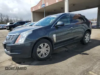 2014 Cadillac SRX Luxury Collection z VIN 3GYFNEE3XES599687, wystawiony jako Copart lot #53027385 z przebiegiem 122 907 mil mil oraz Szkoda całkowita • Salvage title. Historia ofert i sprzedaży dostępna na DreamBid. Obrazek 1.