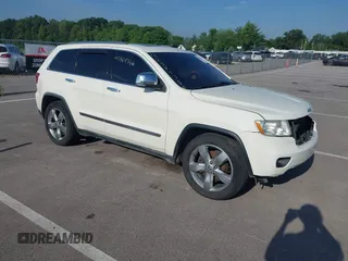 2011 Jeep Grand Cherokee Overland with VIN 1J4RR6GT2BC631909, listed as a IAAI auction lot 42564356 with 205,954 mi miles and . Bid and sale history available at DreamBid. Image 1.