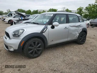 2012 MINI Countryman S z VIN WMWZC5C56CWM14417, wystawiony jako Copart lot #59459935 z przebiegiem 153 875 mil mil oraz Szkoda całkowita • Salvage title. Historia ofert i sprzedaży dostępna na DreamBid. Obrazek 1.