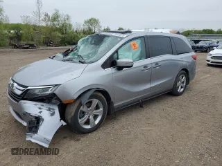 2019 Honda Odyssey EX-L z VIN 5FNRL6H7XKB049729, wystawiony jako Copart lot #55953075 z przebiegiem 129 194 mil mil oraz Szkoda całkowita • Salvage title. Historia ofert i sprzedaży dostępna na DreamBid. Obrazek 1.