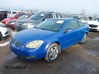 2008 Pontiac G5 with VIN 1G2AL18F887188705, listed as a IAAI auction lot 40978694 with 148,438 mi miles. Bid and sale history available at carsss.com. Image 2.