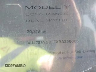 2024 Tesla Model Y Long Range z VIN 7SAYGDEEXRA236065, wystawiony jako IAAI lot #41834658 z przebiegiem 20 313 mil mil oraz . Historia ofert i sprzedaży dostępna na DreamBid. Obrazek 16.