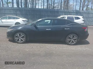 2016 Nissan Maxima 3.5 SV with VIN 1N4AA6AP1GC406660, listed as a IAAI auction lot 42097601 with 267,723 mi miles. Bid and sale history available at carsss.com. Image 14.
