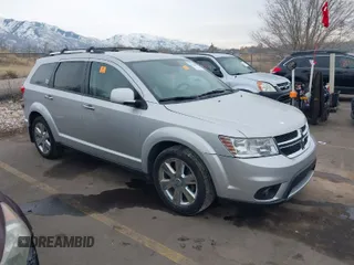 2013 Dodge Journey R/T z VIN 3C4PDDFG4DT736799, wystawiony jako IAAI lot #41470692 z przebiegiem 214 424 mil mil oraz . Historia ofert i sprzedaży dostępna na DreamBid. Obrazek 1.