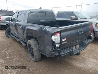 2023 Toyota Tacoma SR with VIN 3TYCZ5AN5PT138770, listed as a IAAI auction lot 41461423 with 19,785 mi miles and . Bid and sale history available at DreamBid. Image 3.