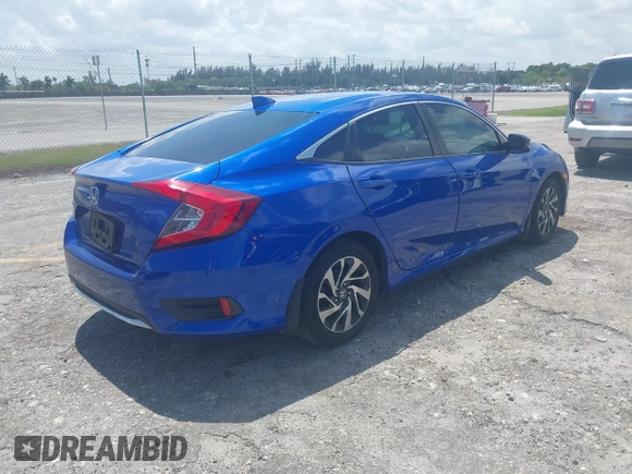 2018 Honda Civic EX with VIN 19XFC2F72JE036055, listed as a IAAI auction lot 41960037 with 128,650 mi miles and . Bid and sale history available at DreamBid. Image 4.