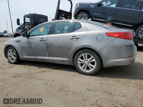2013 Kia Optima EX z VIN 5XXGN4A74DG090437, wystawiony jako Copart lot #60822225 z przebiegiem 138 596 mil mil oraz Czysty tytuł • Clean title. Historia ofert i sprzedaży dostępna na DreamBid. Obrazek 2.