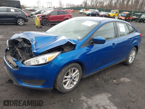 2018 Ford Focus SE z VIN 1FADP3F23JL200674, wystawiony jako IAAI lot #42009238 z przebiegiem 78 007 mil mil oraz . Historia ofert i sprzedaży dostępna na DreamBid. Obrazek 2.