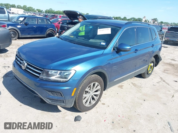 2018 Volkswagen Tiguan SEL z VIN 3VV3B7AX2JM155306, wystawiony jako IAAI lot #42457735 z przebiegiem 48 061 mil mil oraz . Historia ofert i sprzedaży dostępna na DreamBid. Obrazek 17.