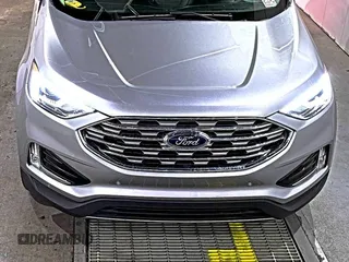 2020 Ford Edge Titanium with VIN 2FMPK3K95LBA30678, listed as a IAAI auction lot 42714178 with 60,935 mi miles and . Bid and sale history available at DreamBid. Image 7.
