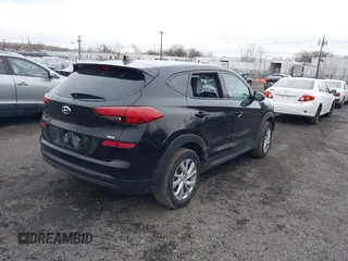 2019 Hyundai Tucson SE with VIN KM8J2CA47KU895799, listed as a IAAI auction lot 41141493 with 44,765 mi miles. Bid and sale history available at carsss.com. Image 4.