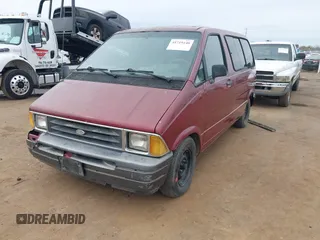 1989 Ford Aerostar with VIN 1FMCA11U2KZC19215, listed as a IAAI auction lot 41719140 with 3,566 mi miles. Bid and sale history available at carsss.com. Image 2.